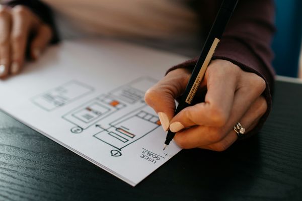 Creative web designer planning a visual website layout